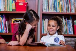 two girls reading
