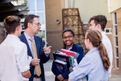 teacher and students outside
