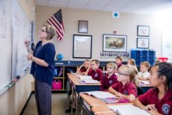 teacher at white board
