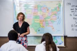 teacher at a map