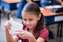 girl looking at flash cards